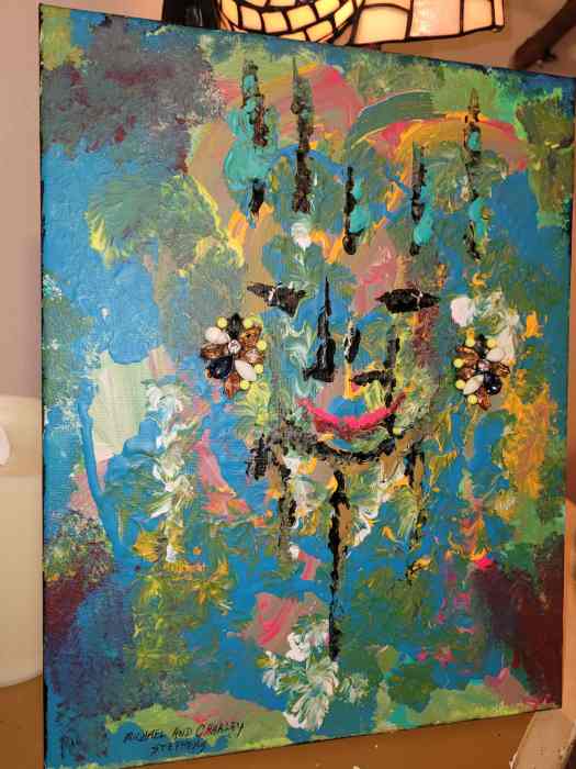 fingerpainting of artist's granddaughter done with the child